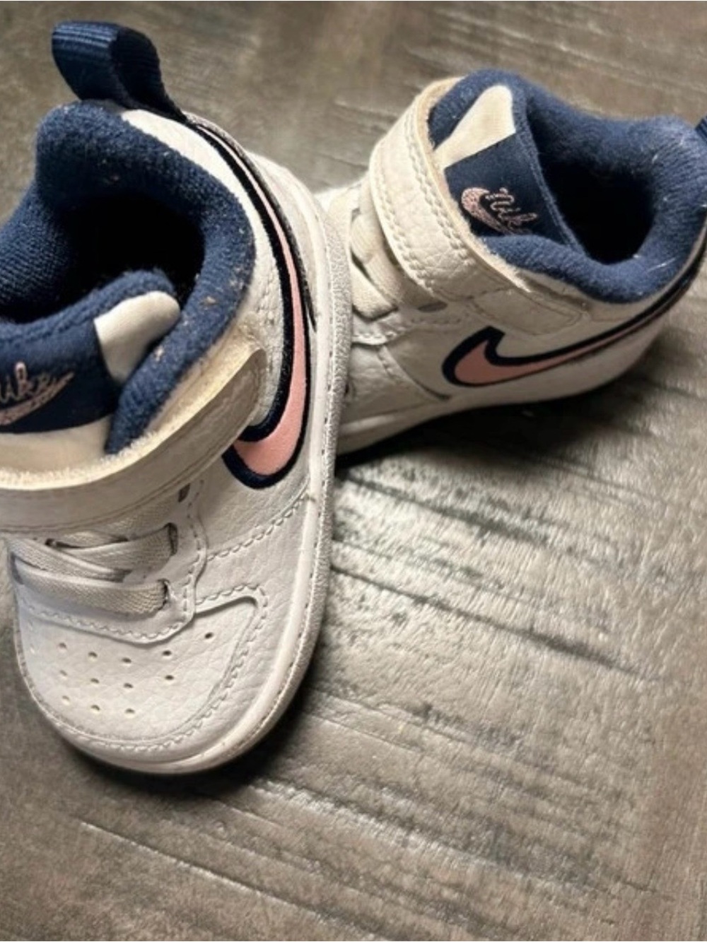 Nike White Kids Sneakers with Pink Swoosh and Navy Lining
